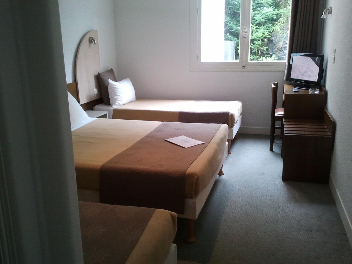 Habitación Cuádruple (2 adultos + 2 niños)